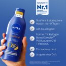 NIVEA body Hautstraffende Body Milk Q10 6er Pack (6x400ml Flasche) + usy Block