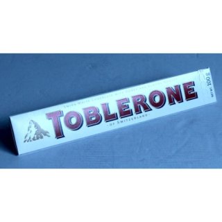 Toblerone White Weiße Schokolade mit Honig und Mandeln (100g Packung)