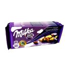 Milka Kuhflecken Alpenmilch Schokolade mit weißen...